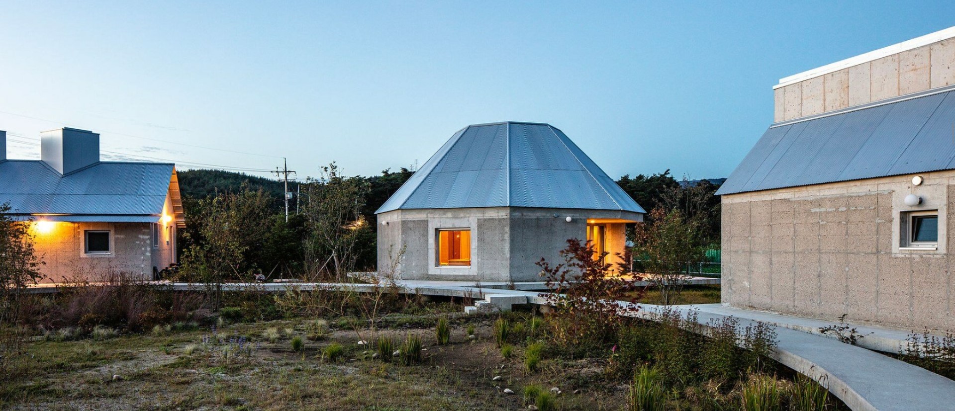 curious concrete dwellings by aoa architects seemingly hover above korean countryside - 14757